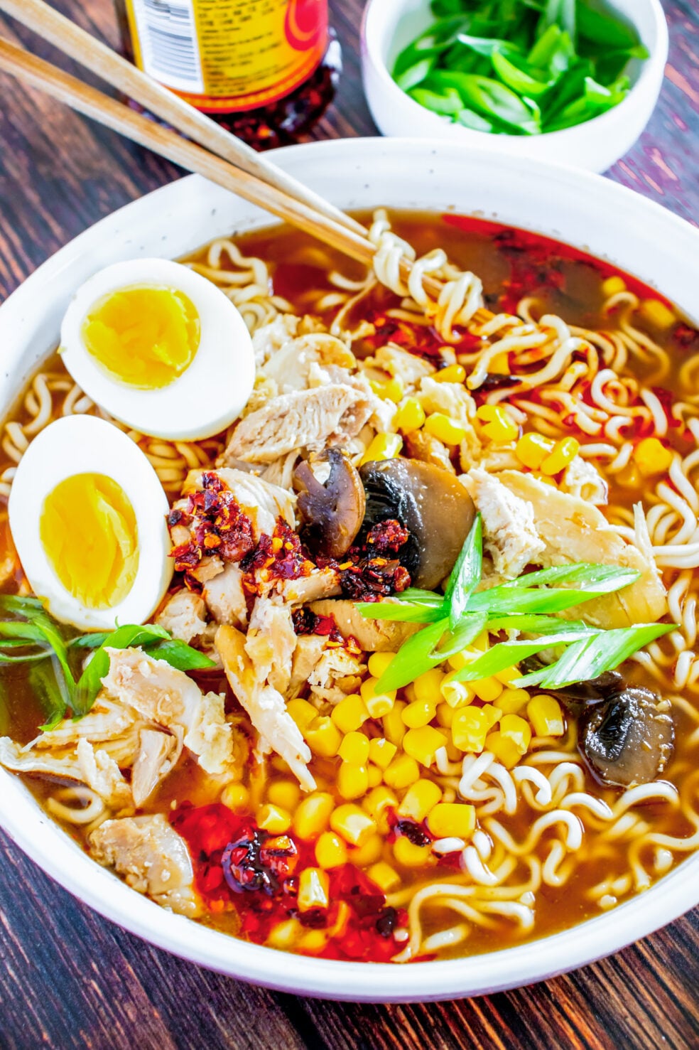 prepared ramen in bowl with chop sticks