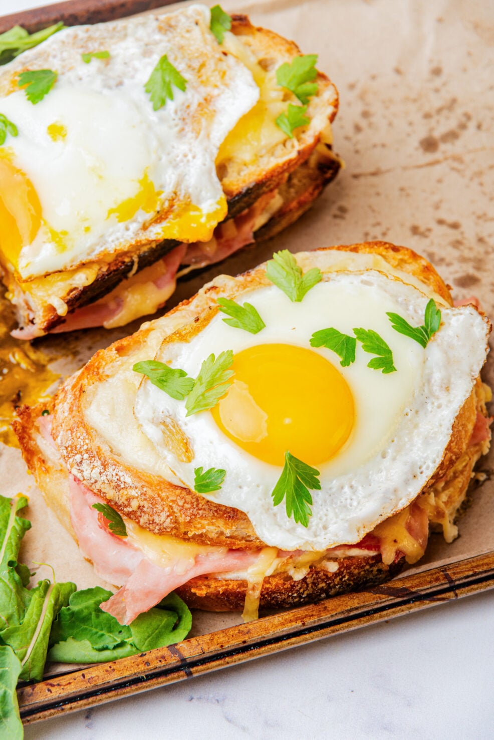 prepared sandwich with fried egg on top
