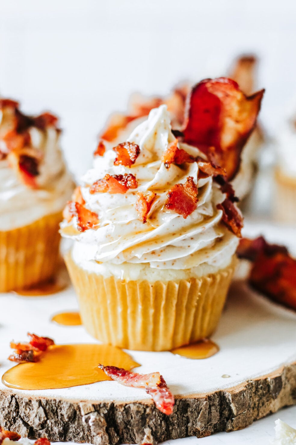 prepared cupcakes topped with bacon