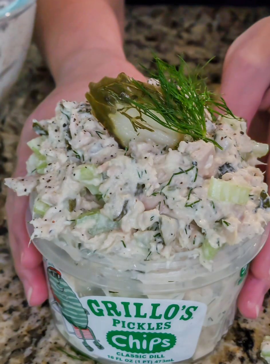 prepared tuna salad in pickle container